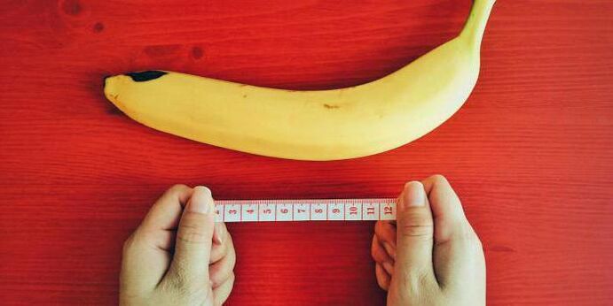 Measuring the penis with a banana sample before enlargement