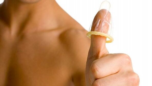 condom on the finger and penis enlargement of a teenager